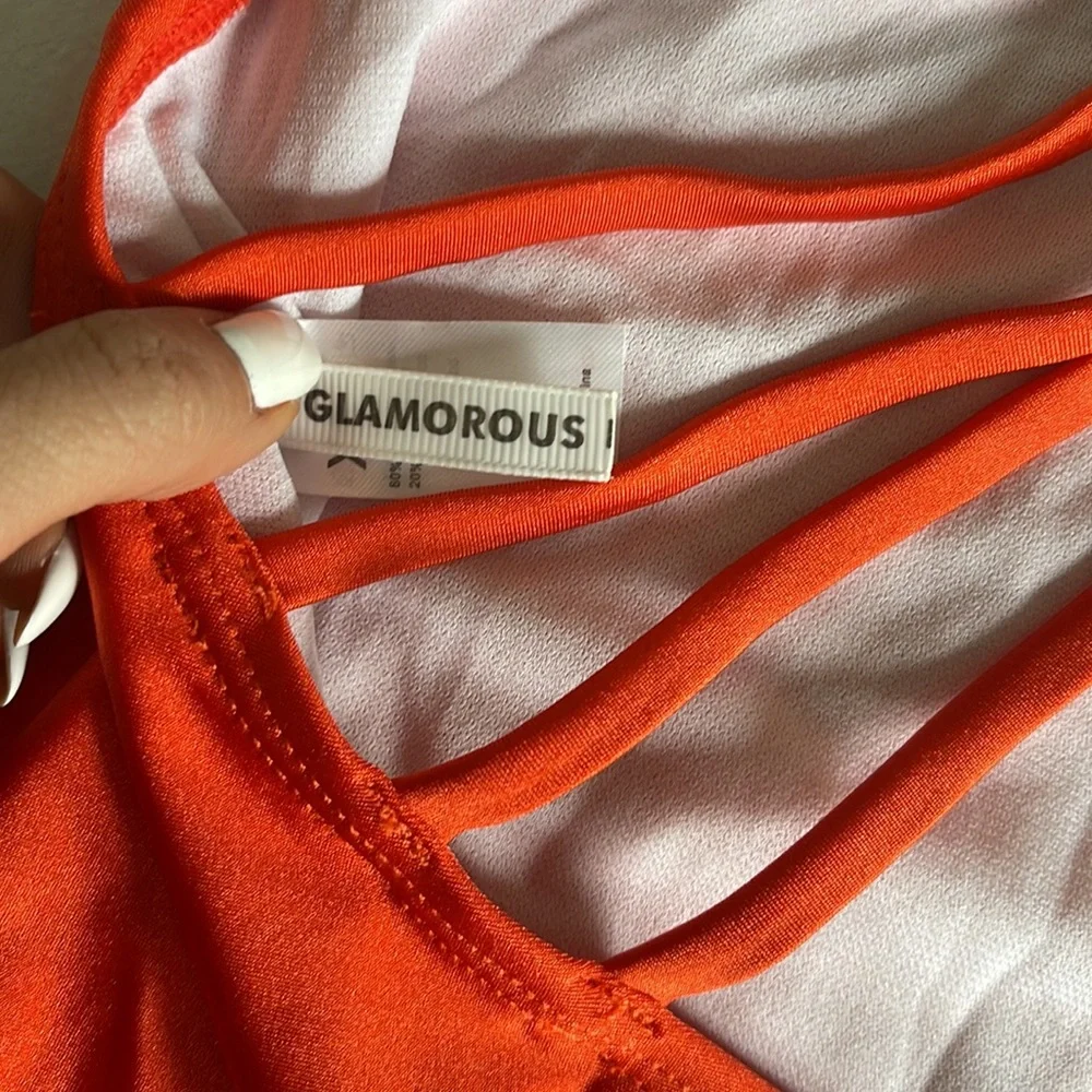Glamorous bright orange one piece bathing suit